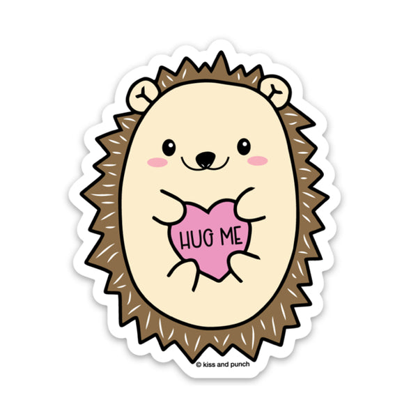 Cute hedgehog holding pink heart saying Hug Me